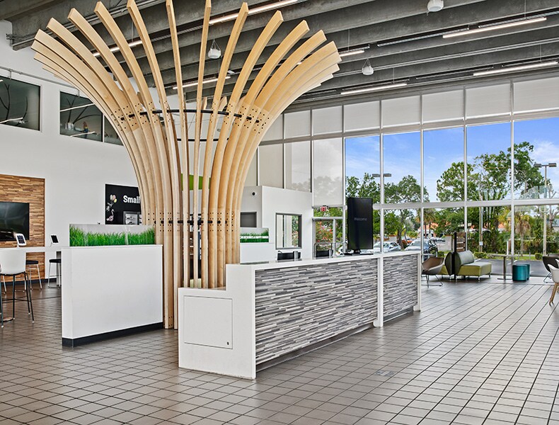 Front desk entrance at EchoPark is welcoming with modern architecture and bright interior.