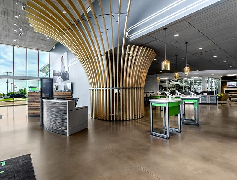 Front desk entrance at EchoPark is welcoming with modern architecture and bright interior.