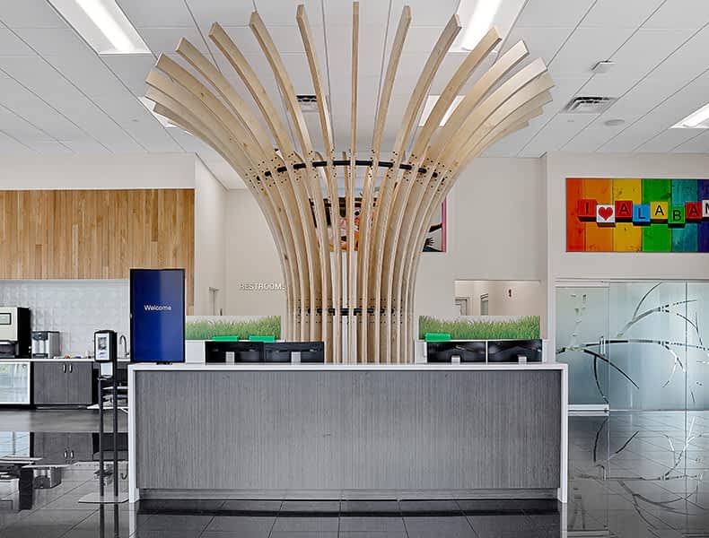 Front desk entrance at EchoPark is welcoming with modern architecture and bright interior.