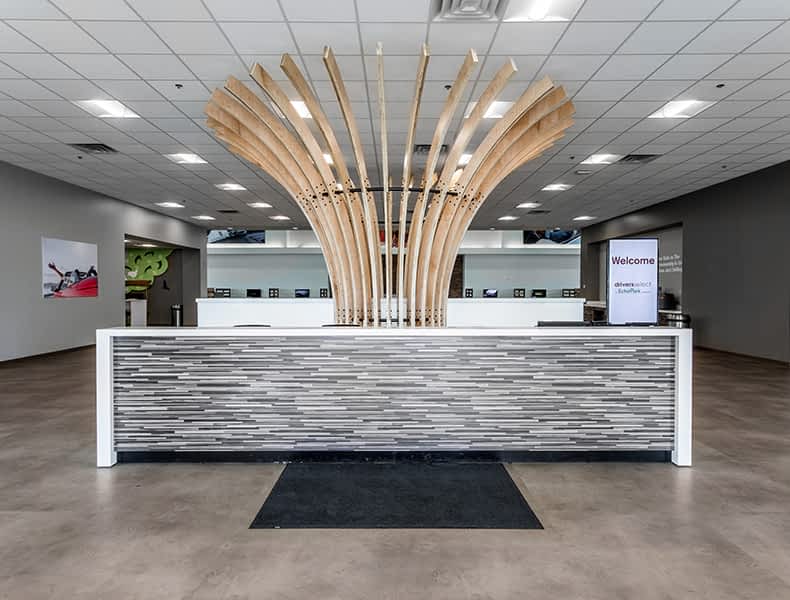 Front desk entrance at EchoPark is welcoming with modern architecture and bright interior.