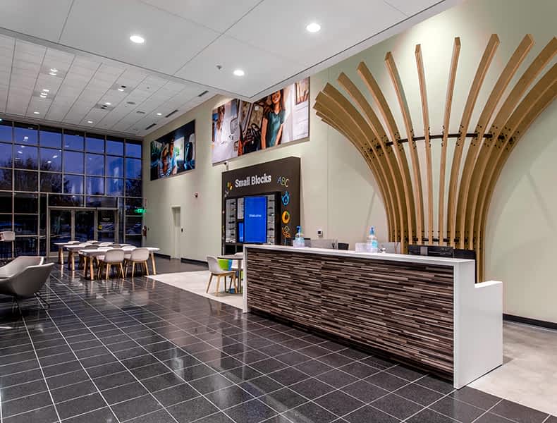 Front desk entrance at EchoPark is welcoming with modern architecture and bright interior.