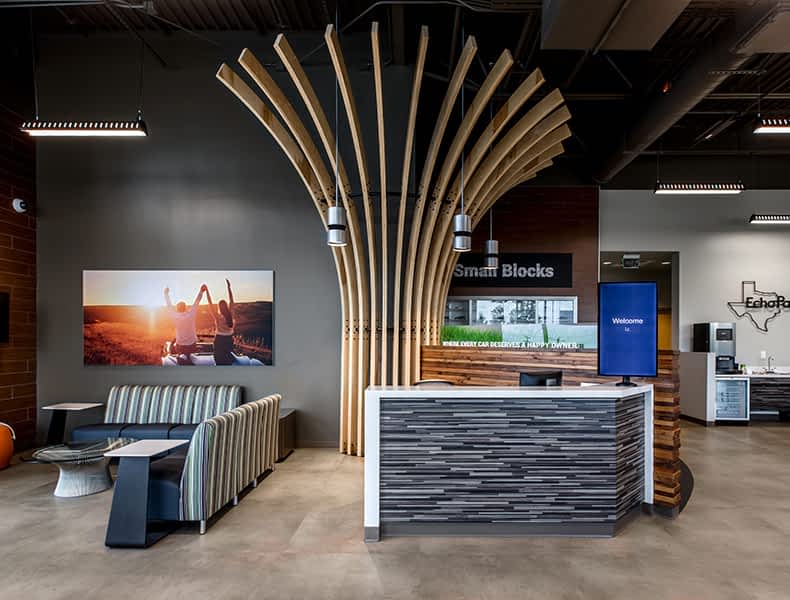Front desk entrance at EchoPark is welcoming with modern architecture and bright interior.