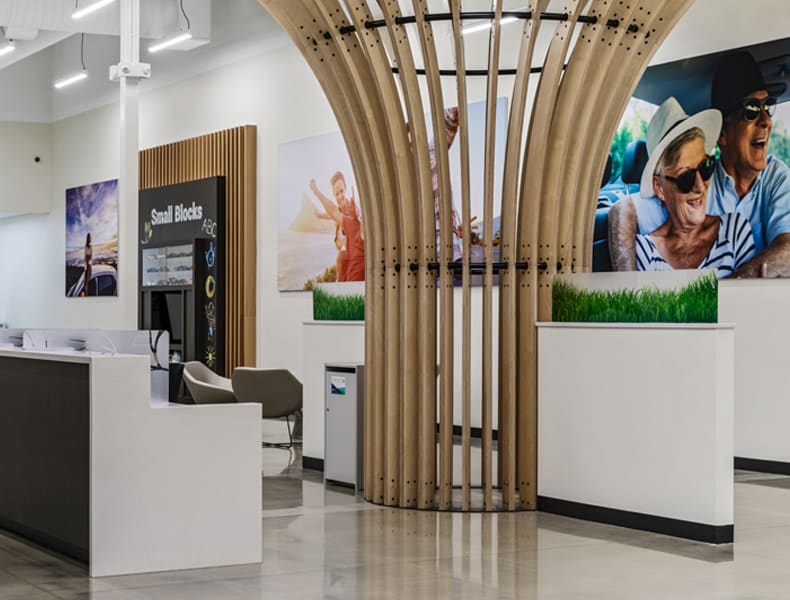 Front desk entrance at EchoPark is welcoming with modern architecture and bright interior.