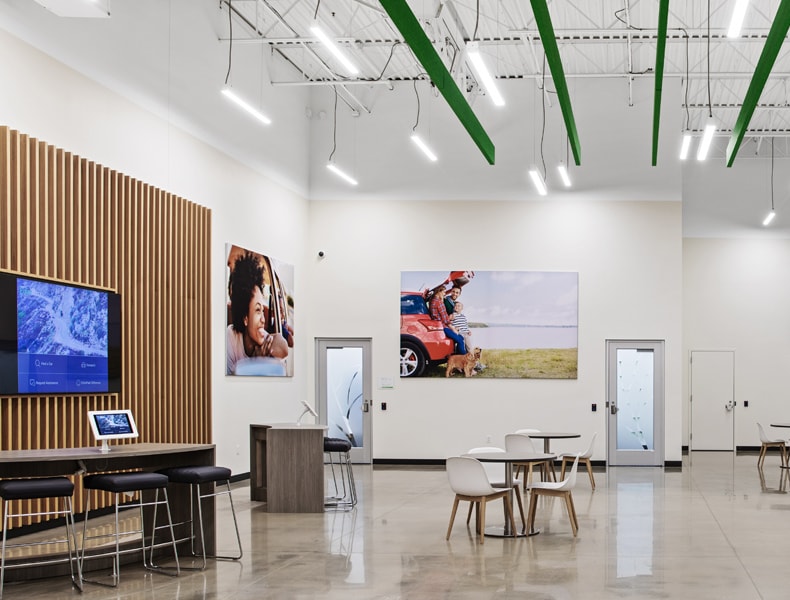 Another view of an EchoPark store, showing a bright interior with modern fixtures and furnishings.