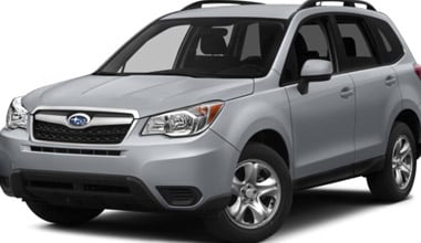 Image is of a silver Subaru Forester on a white background. 