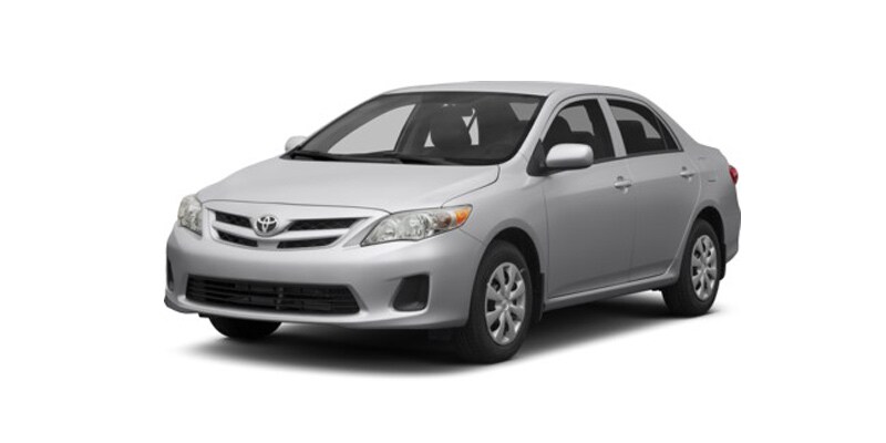 Image shows a silver Toyota Corolla on a white background.